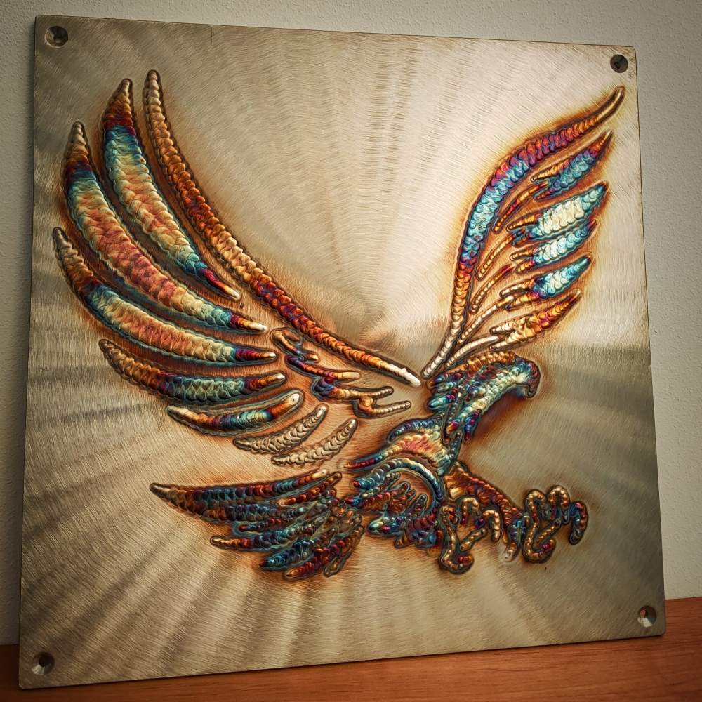 Vibrant eagle wall art crafted in stainless steel with multicolored welded detailing